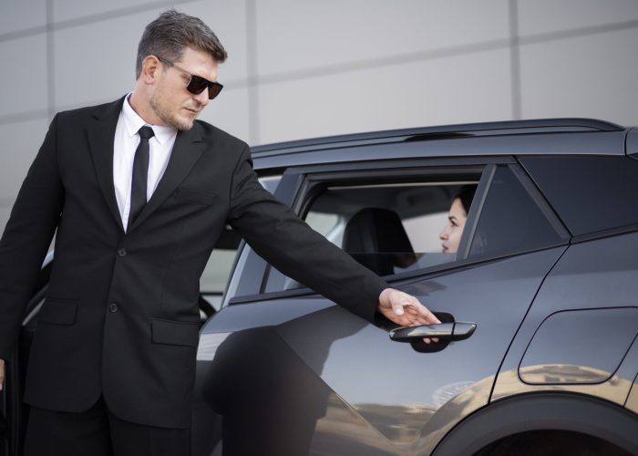 young male being uber driver female client